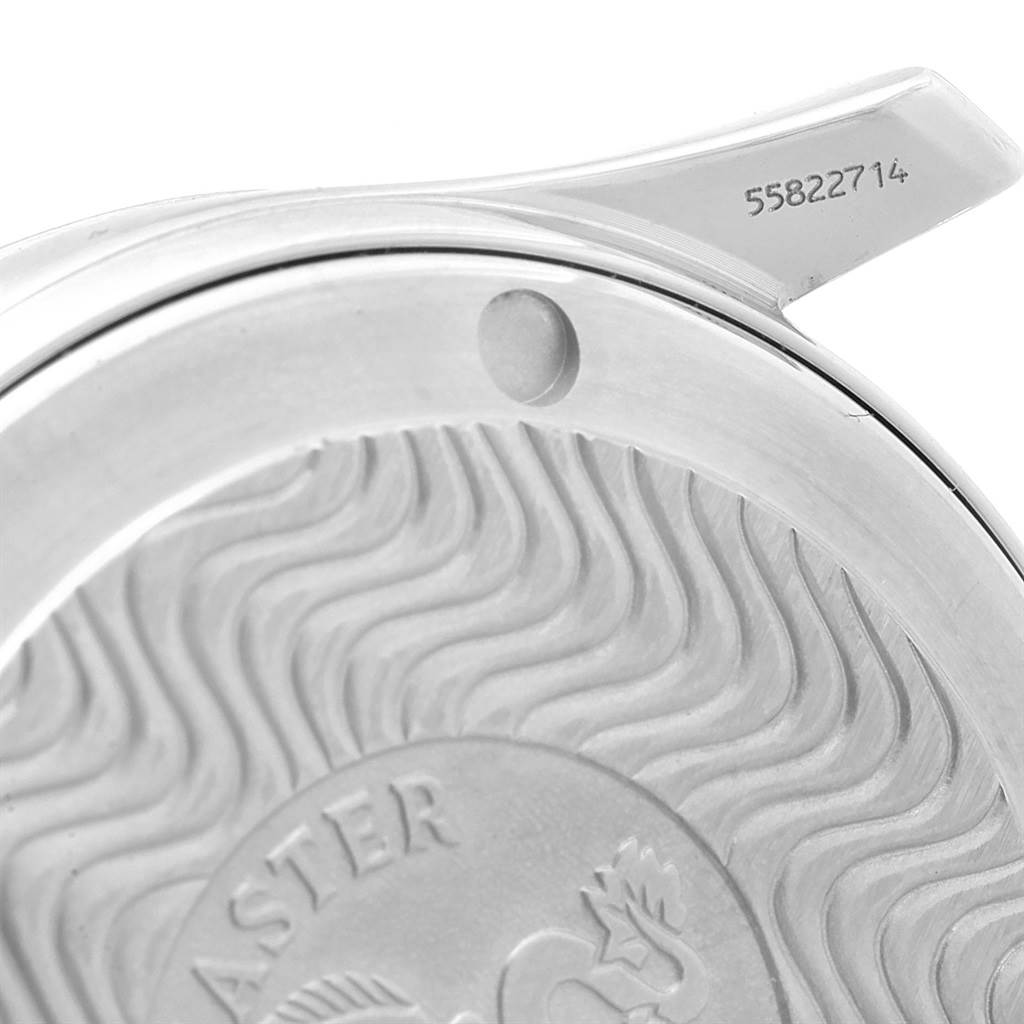 Close-up of the case back and serial number area on an Omega Seamaster 2561.80.00 Men's Stainless Steel Blue Dial 2561.80.00 Men's Stainless Steel Blue Dial watch, showing the engraved design and wave pattern.