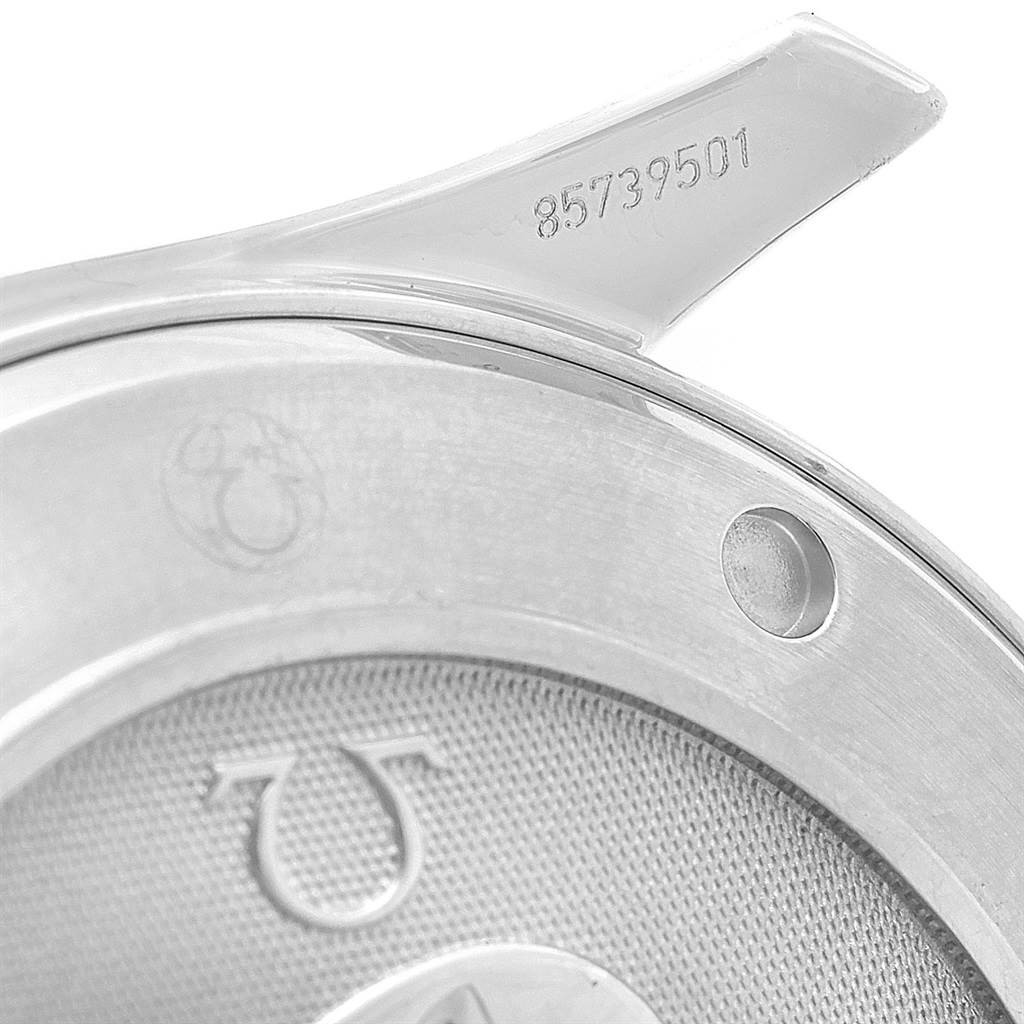 The image shows a close-up of the case back of an Omega Seamaster 212.30.41.20.01.002 Men
s Stainless Steel Black Dial 212.30.41.20.01.002 Men
s Stainless Steel Black Dial watch, including part of a lug and a serial number.