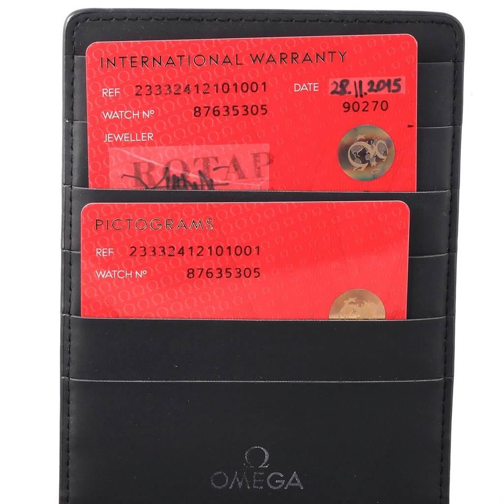 A close-up of the international warranty and pictograms cards for the Omega Seamaster 233.32.41.21.01.001 Men's Stainless Steel Black Dial 233.32.41.21.01.001 Men's Stainless Steel Black Dial model in a black cardholder.
