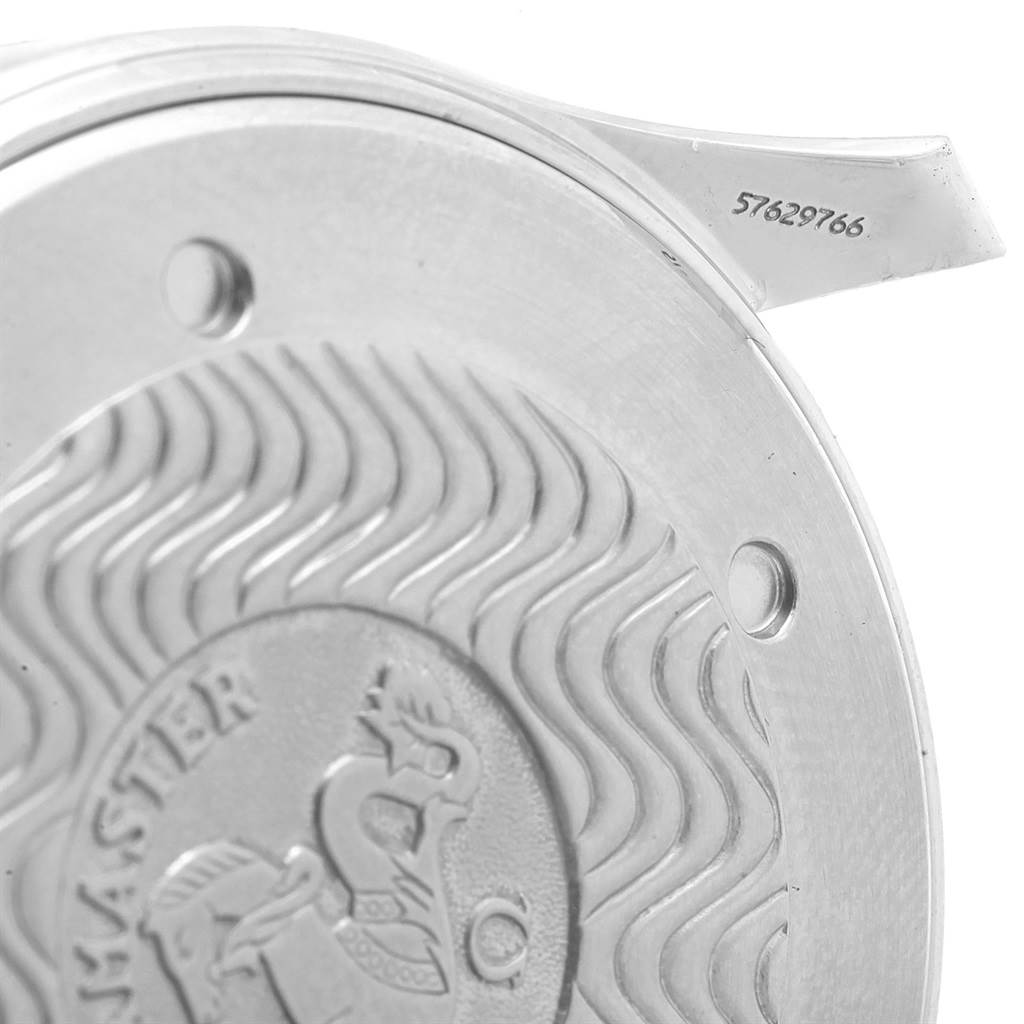 The image shows the back case of an Omega Seamaster 2541.80.00 Men
s Stainless Steel Blue Dial 2541.80.00 Men
s Stainless Steel Blue Dial watch at an angle, highlighting its engraving and serial number.