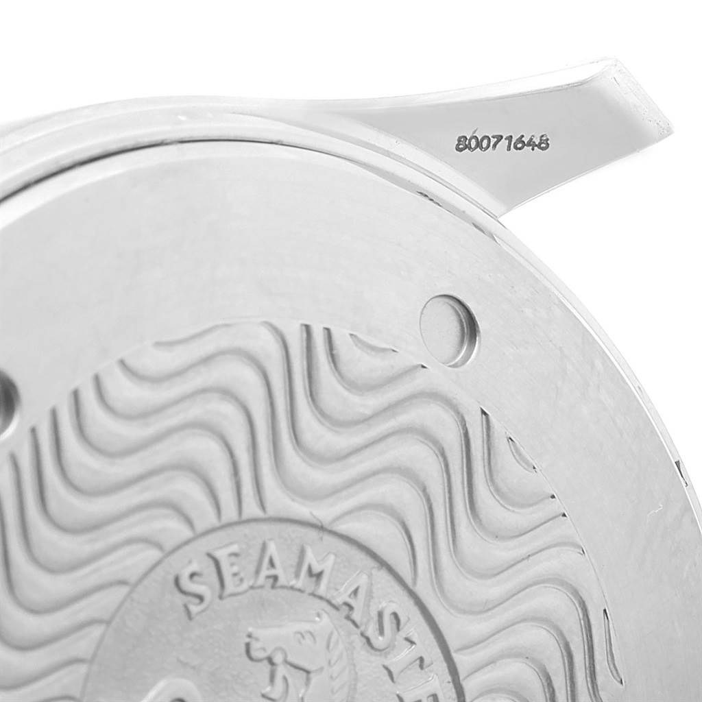 This image shows a close-up of the case back of an Omega Seamaster 2531.80.00 Men
s Stainless Steel Blue Dial 2531.80.00 Men
s Stainless Steel Blue Dial watch, including the serial number and ocean wave pattern engraving.