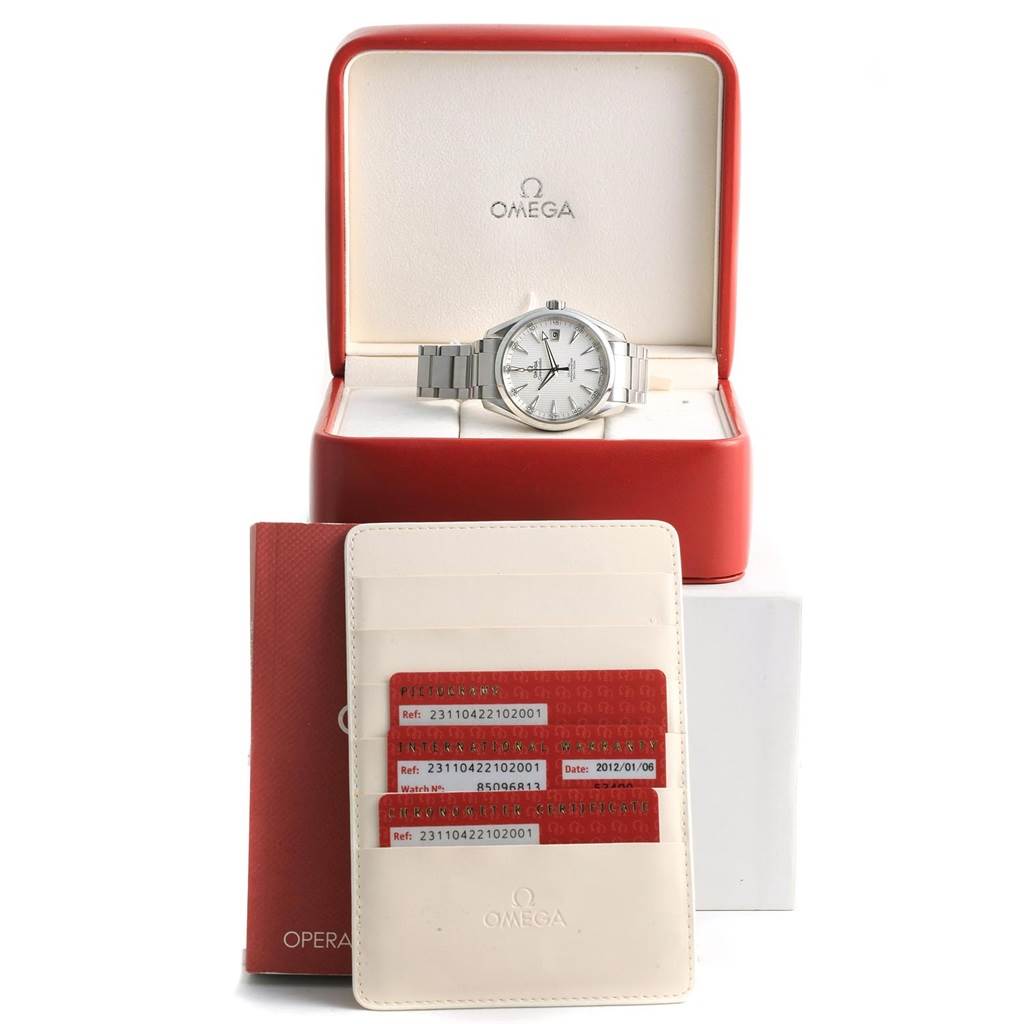 The Omega Aqua Terra 231.10.42.21.02.001 Men
s Stainless Steel Silver Dial 231.10.42.21.02.001 Men
s Stainless Steel Silver Dial watch is shown in its case, along with warranty cards and a booklet in the foreground.
