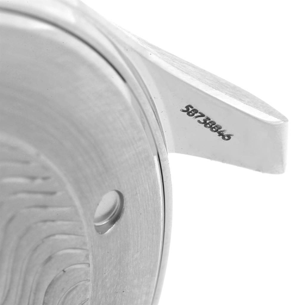 The image shows a close-up angle of the Omega Seamaster 2541.80.00 Men
s Stainless Steel Blue Dial 2541.80.00 Men
s Stainless Steel Blue Dial watch case and lugs, highlighting the serial number engraving.