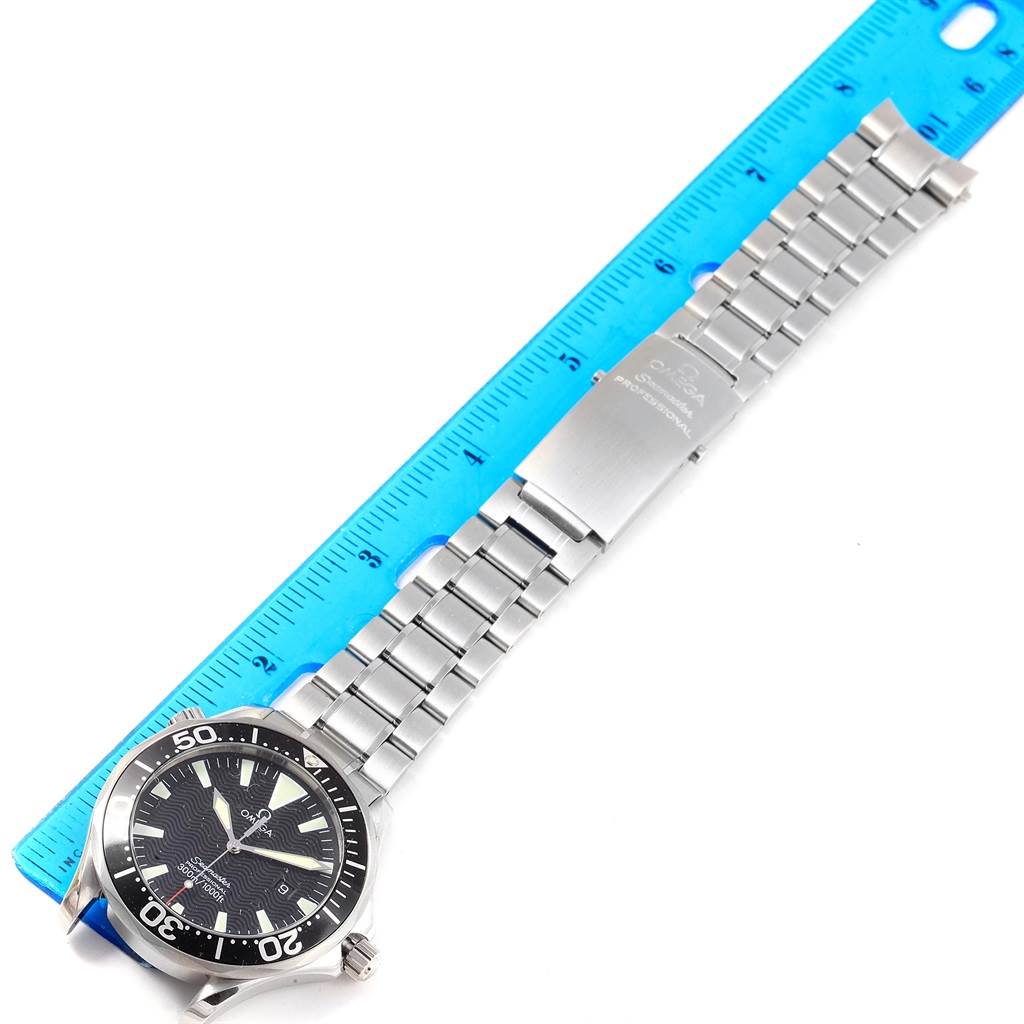 The image shows an Omega Seamaster 2264.50.00 Men
s Stainless Steel Black Dial 2264.50.00 Men
s Stainless Steel Black Dial watch from a top-down angle, highlighting the dial, bezel, and stainless steel bracelet with a clasp.