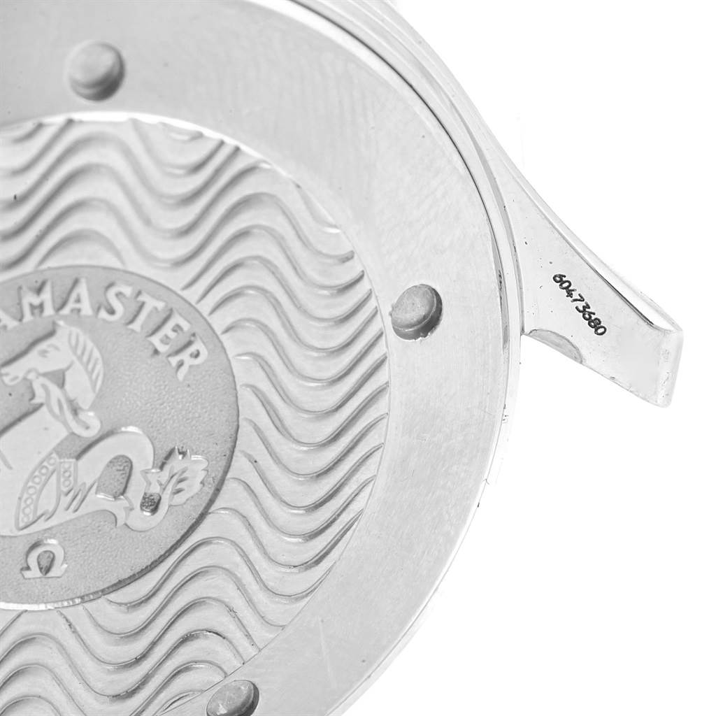 The image shows a close-up of the case back of an Omega Seamaster 2531.80.00 Men
s Stainless Steel Blue Dial 2531.80.00 Men
s Stainless Steel Blue Dial watch, highlighting its engraved design and serial number.