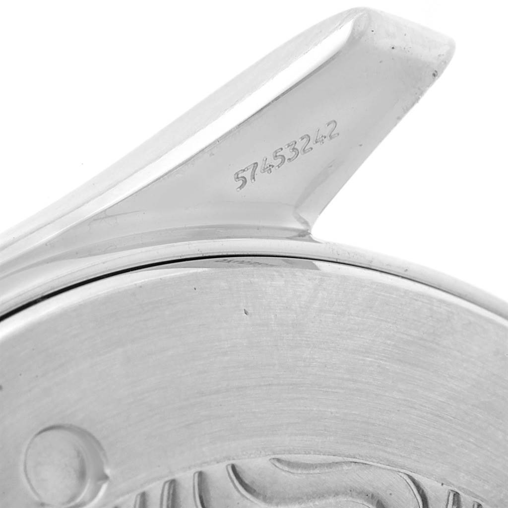 This close-up image shows the side view of an Omega Seamaster 2264.50.00 Men
s Stainless Steel Black Dial 2264.50.00 Men
s Stainless Steel Black Dial watch
s case back and part of a lug, displaying the serial number.