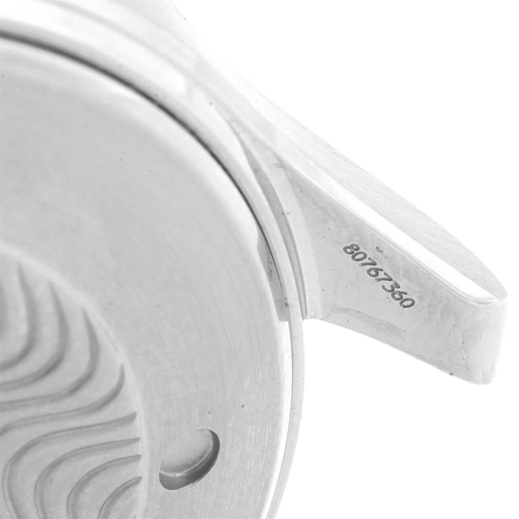 The image shows a close-up of the case back and lug of an Omega Seamaster 2531.80.00 Men
s Stainless Steel Blue Dial 2531.80.00 Men
s Stainless Steel Blue Dial watch, highlighting the engraved serial numbers.