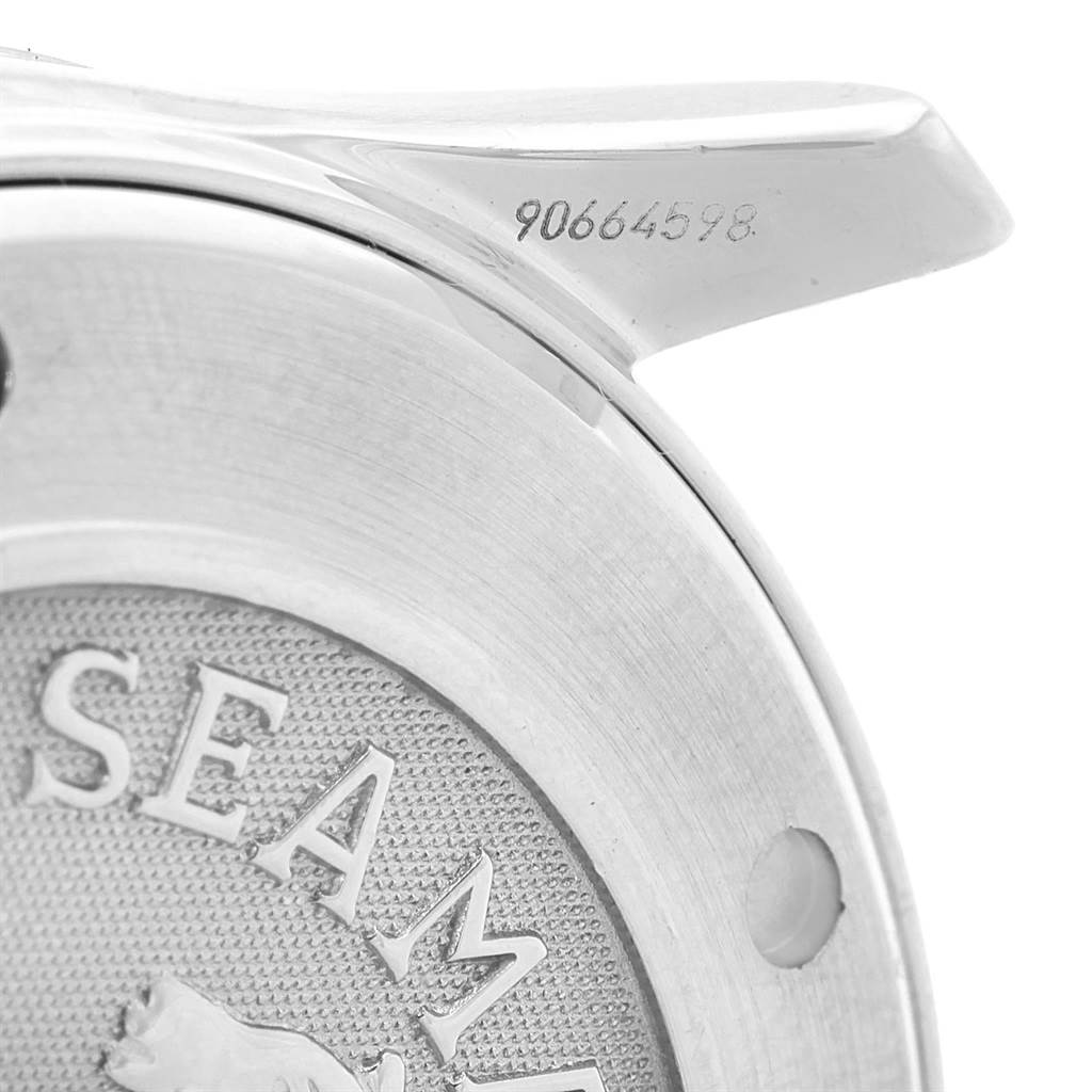 This image shows a close-up of the case back and part of the lug, with the serial number of an Omega Seamaster 212.30.41.61.01.001 Men
s Stainless Steel Black Dial 212.30.41.61.01.001 Men
s Stainless Steel Black Dial watch.