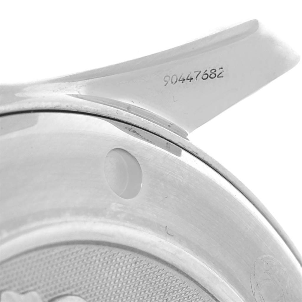 The image shows a close-up of the lug and edge of the case back of an Omega Seamaster 2221.80.00 Men
s Stainless Steel Blue Dial 2221.80.00 Men
s Stainless Steel Blue Dial watch.