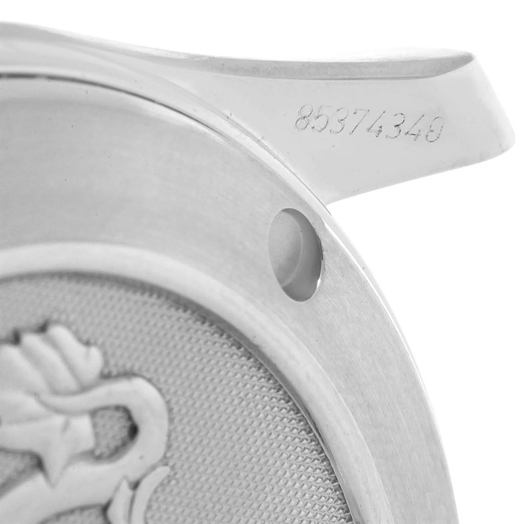 The image shows a close-up of the back case and lug of an Omega Seamaster 212.30.36.20.01.001 Men
s Stainless Steel Black Dial 212.30.36.20.01.001 Men
s Stainless Steel Black Dial watch, displaying the serial number.