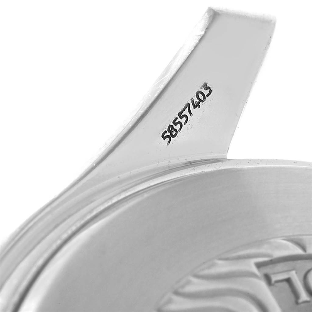 The image shows a detailed close-up of the case back with the serial number of an Omega Seamaster 2595.30.00 Men
s Stainless Steel Silver Dial 2595.30.00 Men
s Stainless Steel Silver Dial watch.