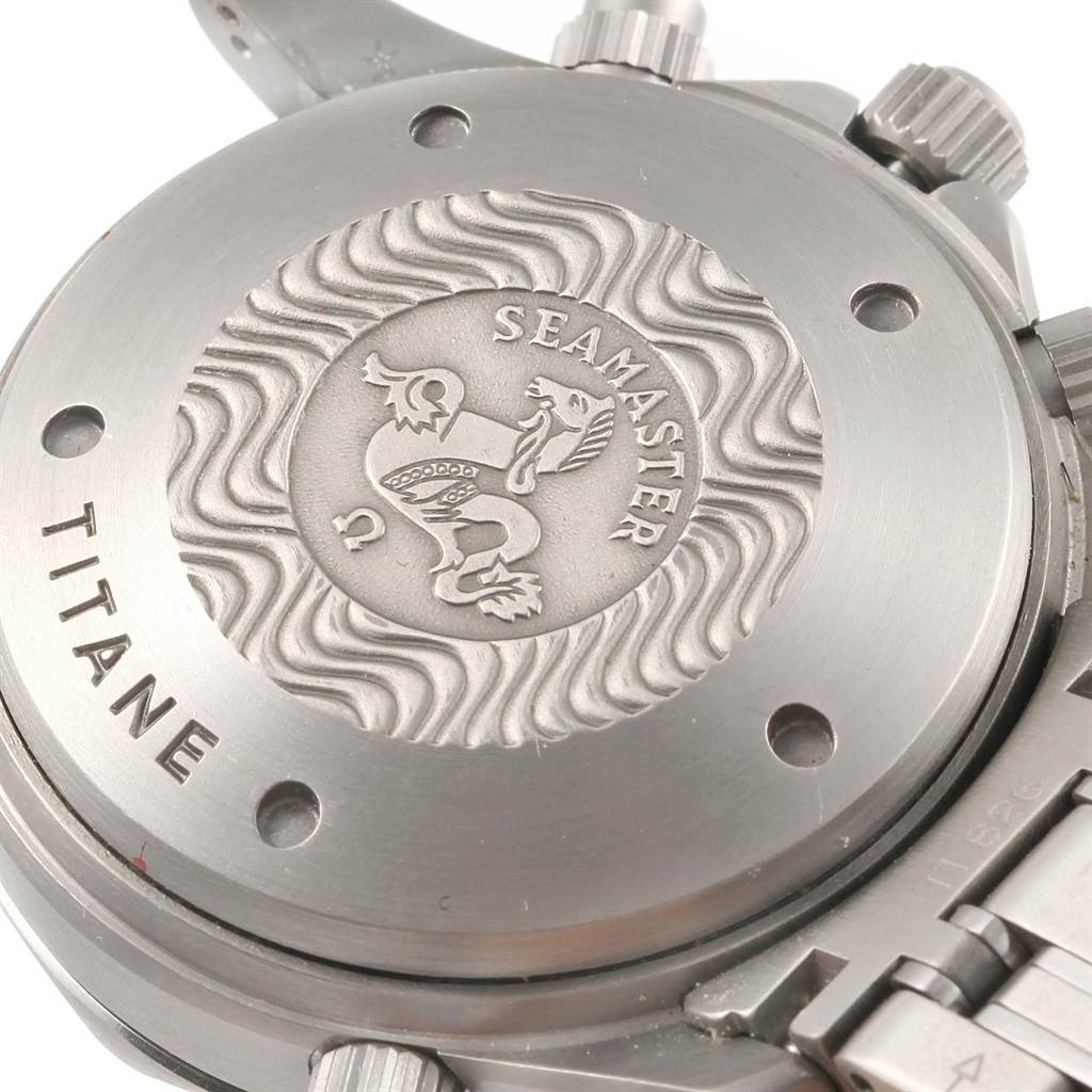 This image shows the case back of the Omega Seamaster 2298.80.00 Men
s Titanium Blue Dial 2298.80.00 Men
s Titanium Blue Dial watch with "Seamaster" and "Titane" engravings.