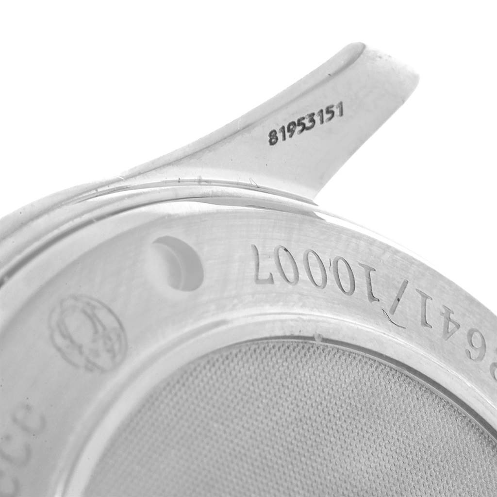 This image shows the case back of the Omega Seamaster 212.30.41.20.01.001 Men
s Stainless Steel Black Dial 212.30.41.20.01.001 Men
s Stainless Steel Black Dial watch, including part of the serial number and some text engraving.