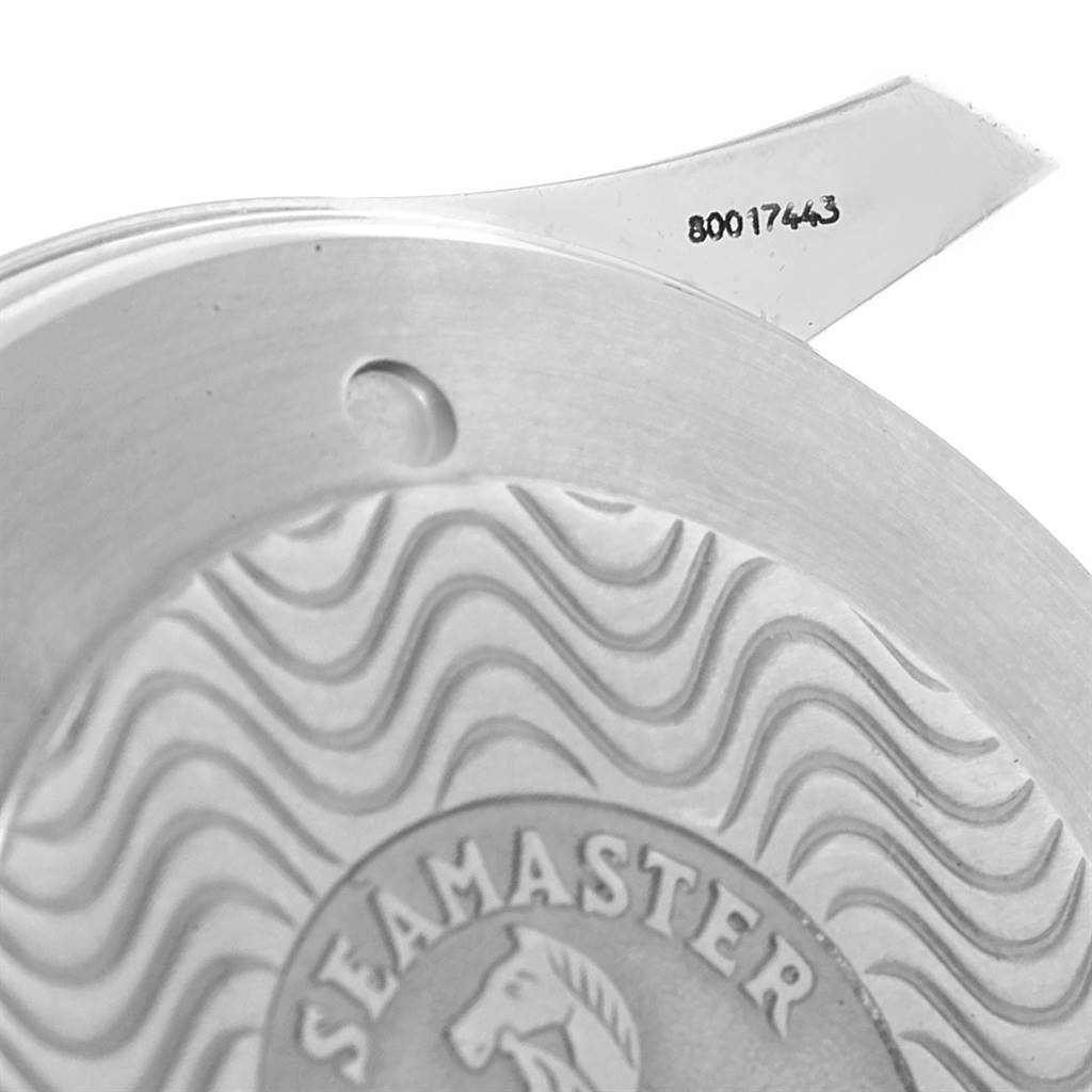 This close-up image showcases the engraved back cover of an Omega Seamaster 2534.50.00 Men
s Stainless Steel Black Dial 2534.50.00 Men
s Stainless Steel Black Dial watch, highlighting the wave pattern and the model name.