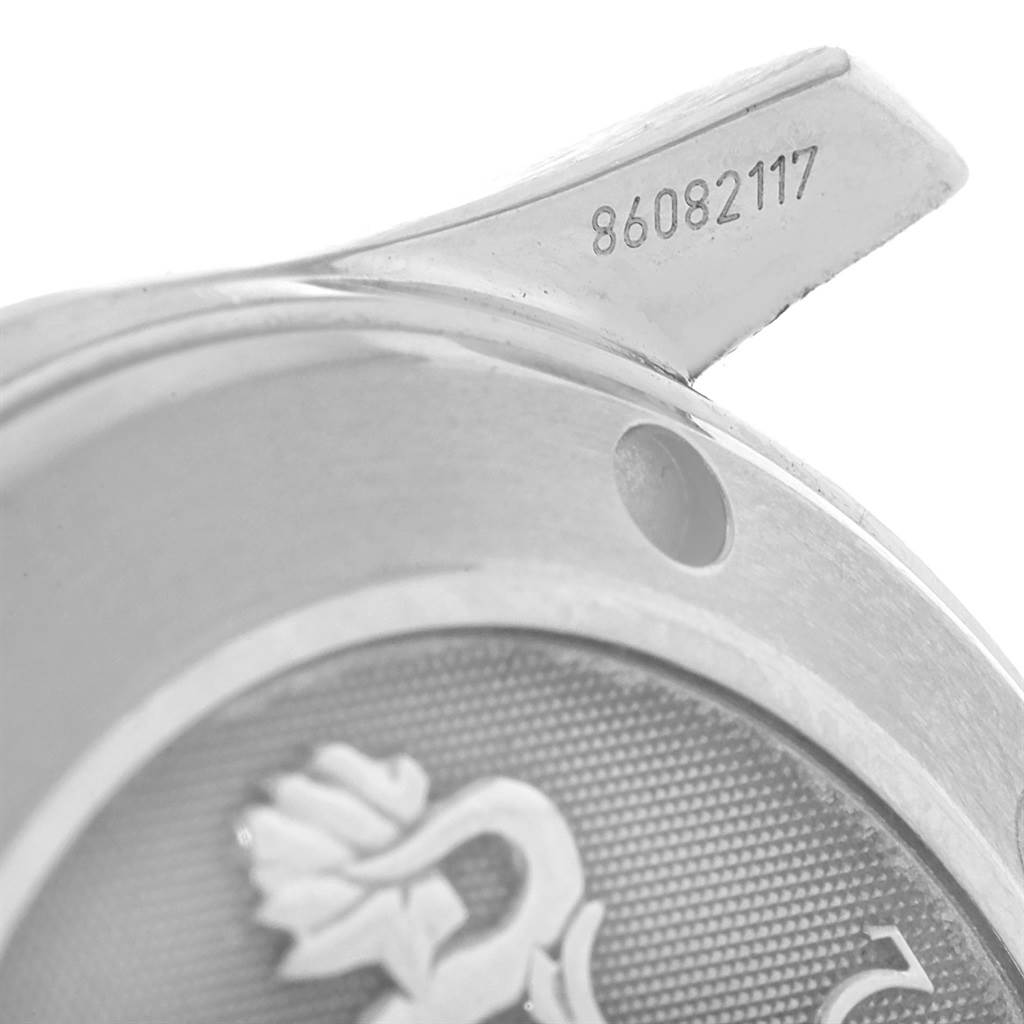 This close-up image shows the engraved serial number and the logo on the back of an Omega Seamaster 212.30.36.20.01.001 Men
s Stainless Steel Black Dial 212.30.36.20.01.001 Men
s Stainless Steel Black Dial watch.