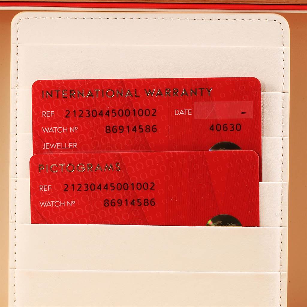 The image shows international warranty and pictogram cards associated with the Omega Seamaster 212.30.44.50.01.002 Men
s Stainless Steel Black Dial 212.30.44.50.01.002 Men
s Stainless Steel Black Dial watch, displayed in a cardholder.