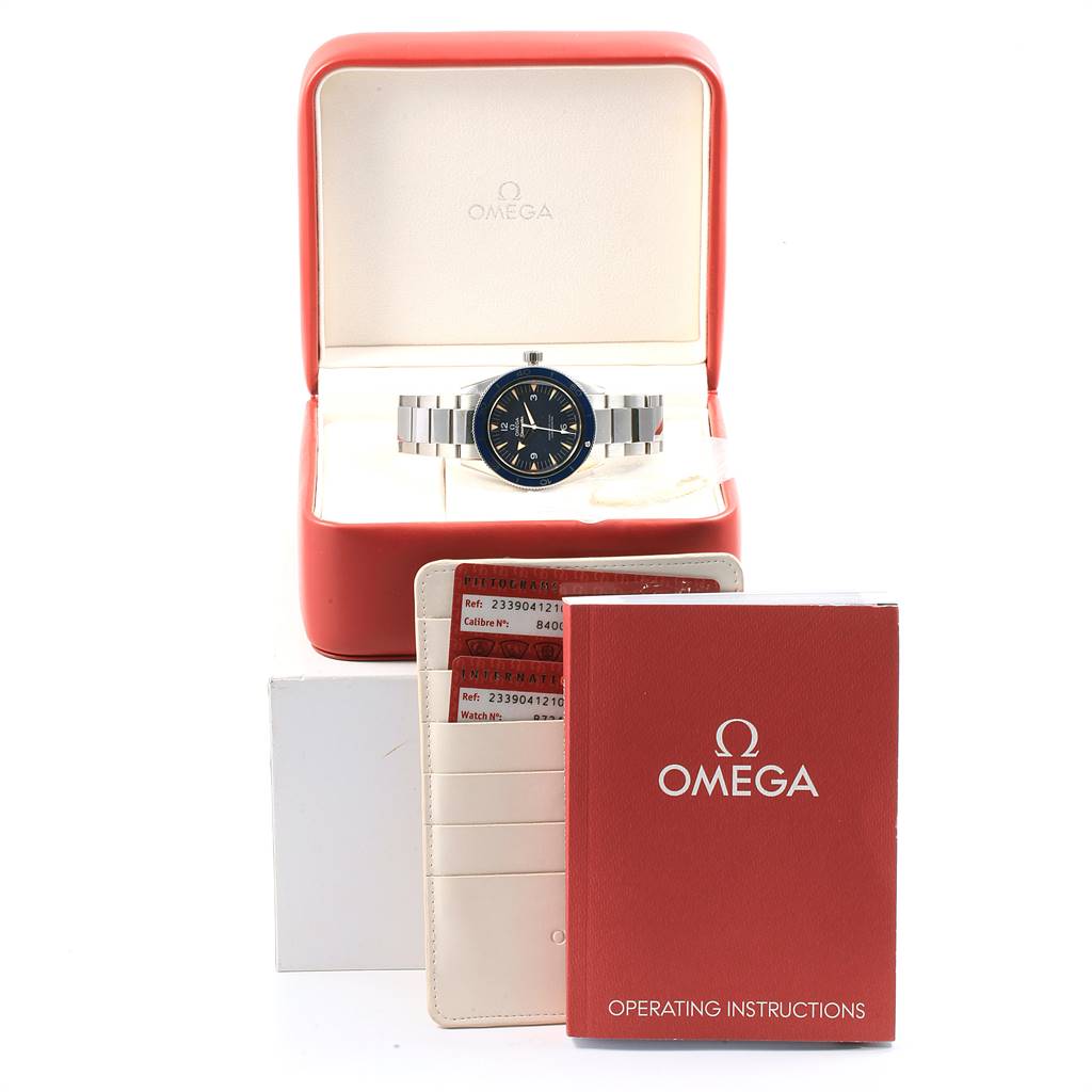 The image shows an Omega Seamaster 233.90.41.21.03.001 Men
s Titanium Blue Dial 233.90.41.21.03.001 Men
s Titanium Blue Dial watch in its box, along with operating instructions and warranty cards.