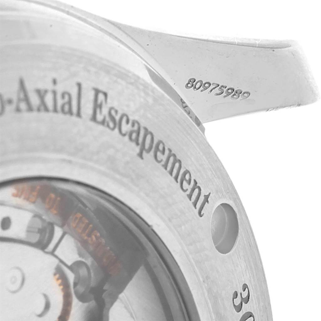 This image shows a close-up of the back of an Omega Seamaster 2535.80.00 Men's Stainless Steel Blue Dial 2535.80.00 Men's Stainless Steel Blue Dial watch, highlighting the "Co-Axial Escapement" text and serial number.