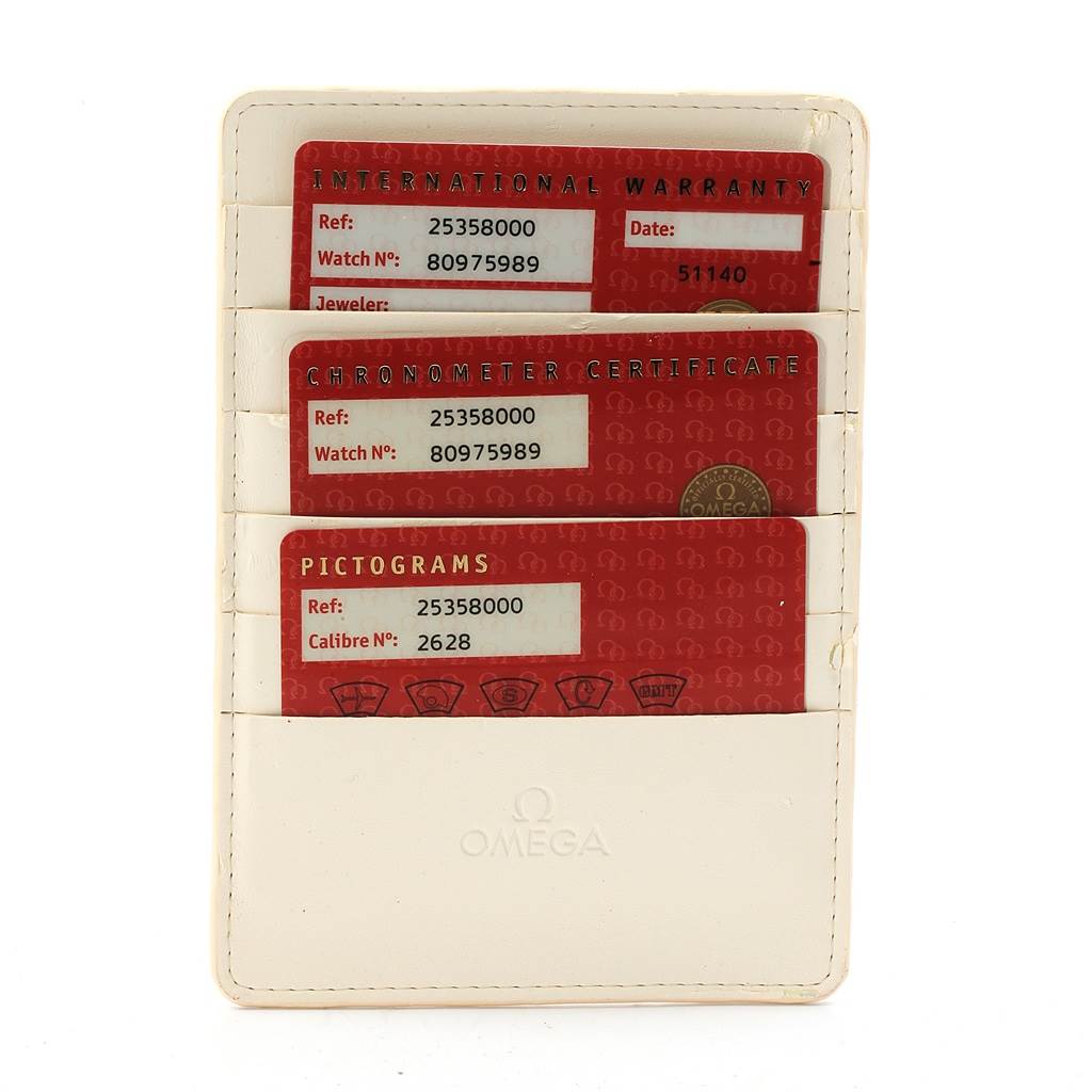 The image shows International Warranty, Chronometer Certificate, and Pictograms cards in a holder for an Omega Seamaster 2535.80.00 Men's Stainless Steel Blue Dial 2535.80.00 Men's Stainless Steel Blue Dial watch.