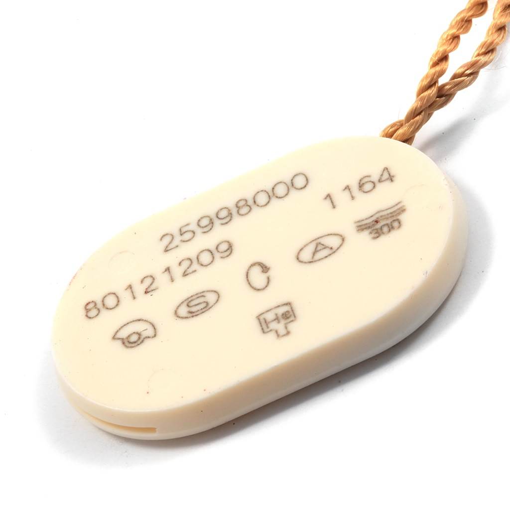 This image shows the back side of a white accessory tag for the Omega Seamaster 2599.80.00 Stainless Steel Blue Dial 2599.80.00 Stainless Steel Blue Dial watch.