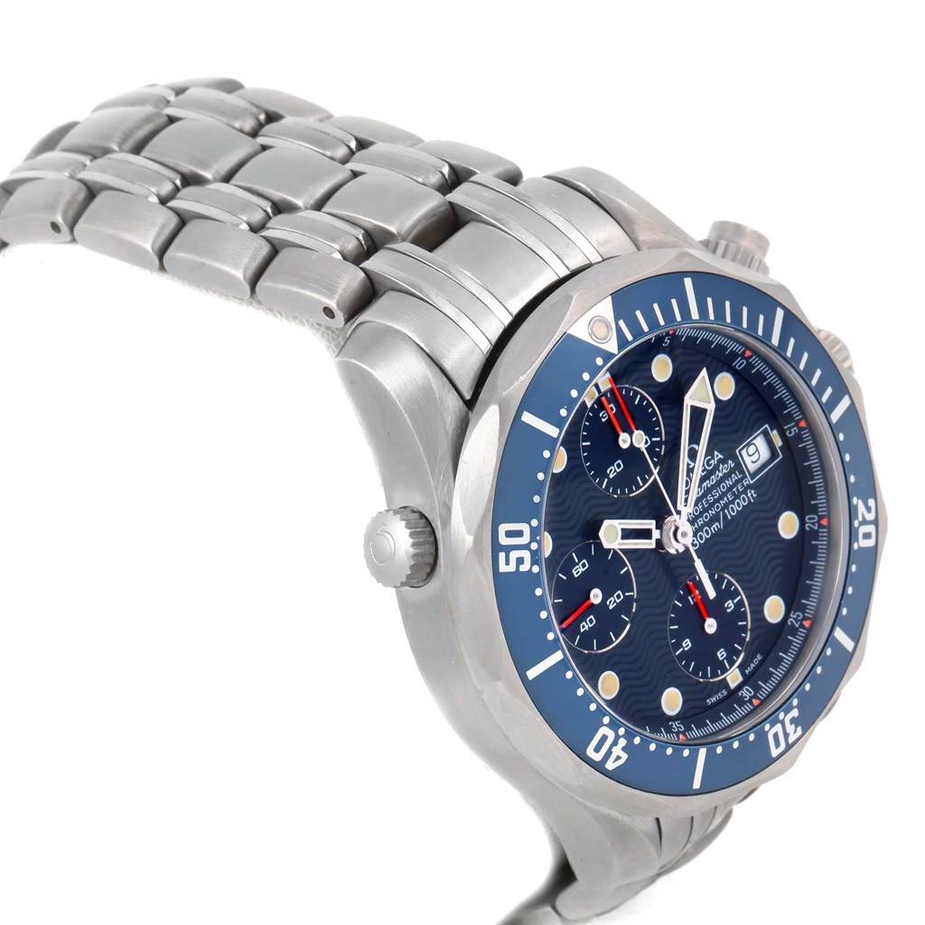 The Omega Seamaster 2298.80.00 Men
s Titanium Blue Dial 2298.80.00 Men
s Titanium Blue Dial watch is shown from a side angle, highlighting the dial, crown, bezel, and metal bracelet.