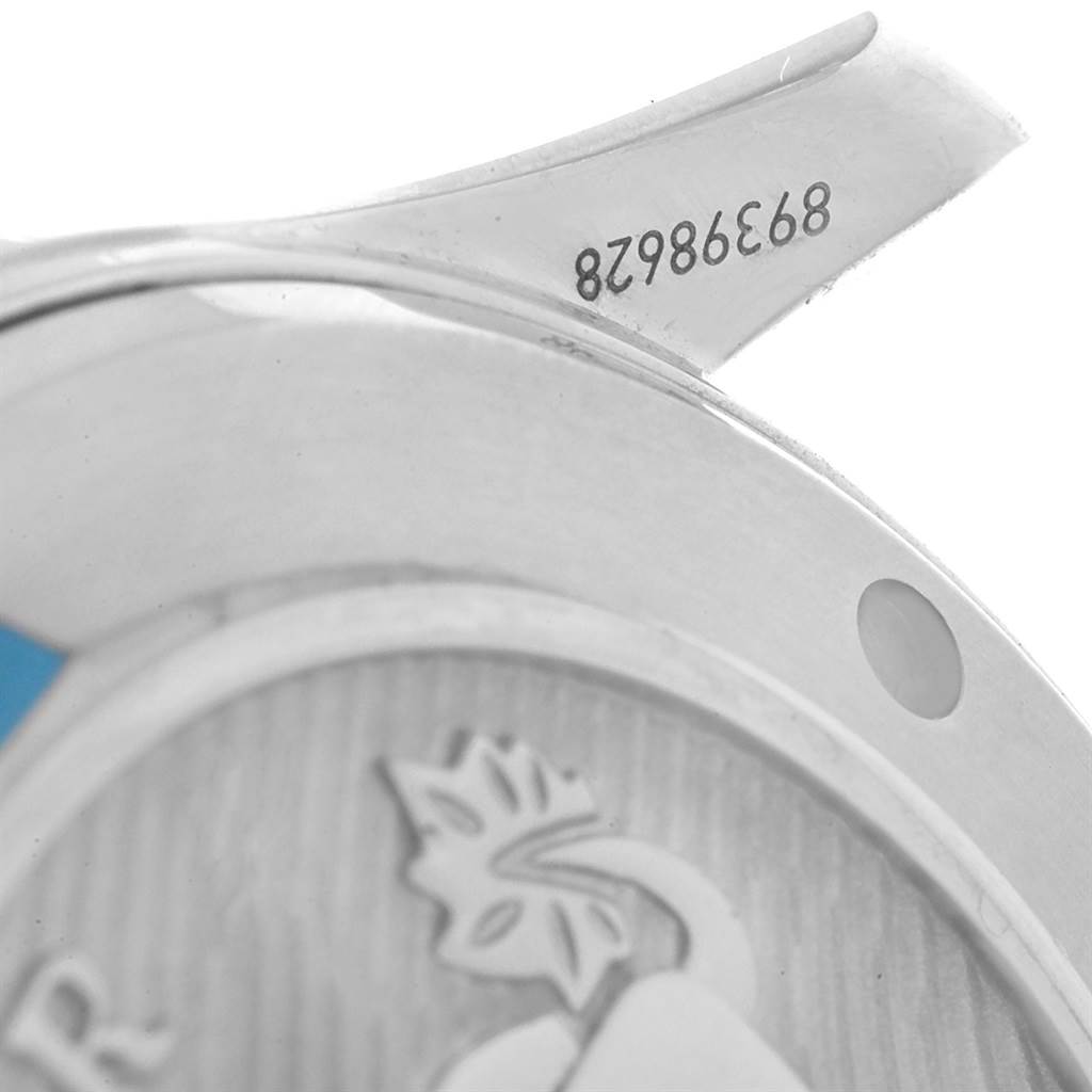 This is a close-up of the case back and a lug of an Omega Seamaster 212.30.41.20.01.003 Men
s Stainless Steel Black Dial 212.30.41.20.01.003 Men
s Stainless Steel Black Dial watch, showing part of the serial number.