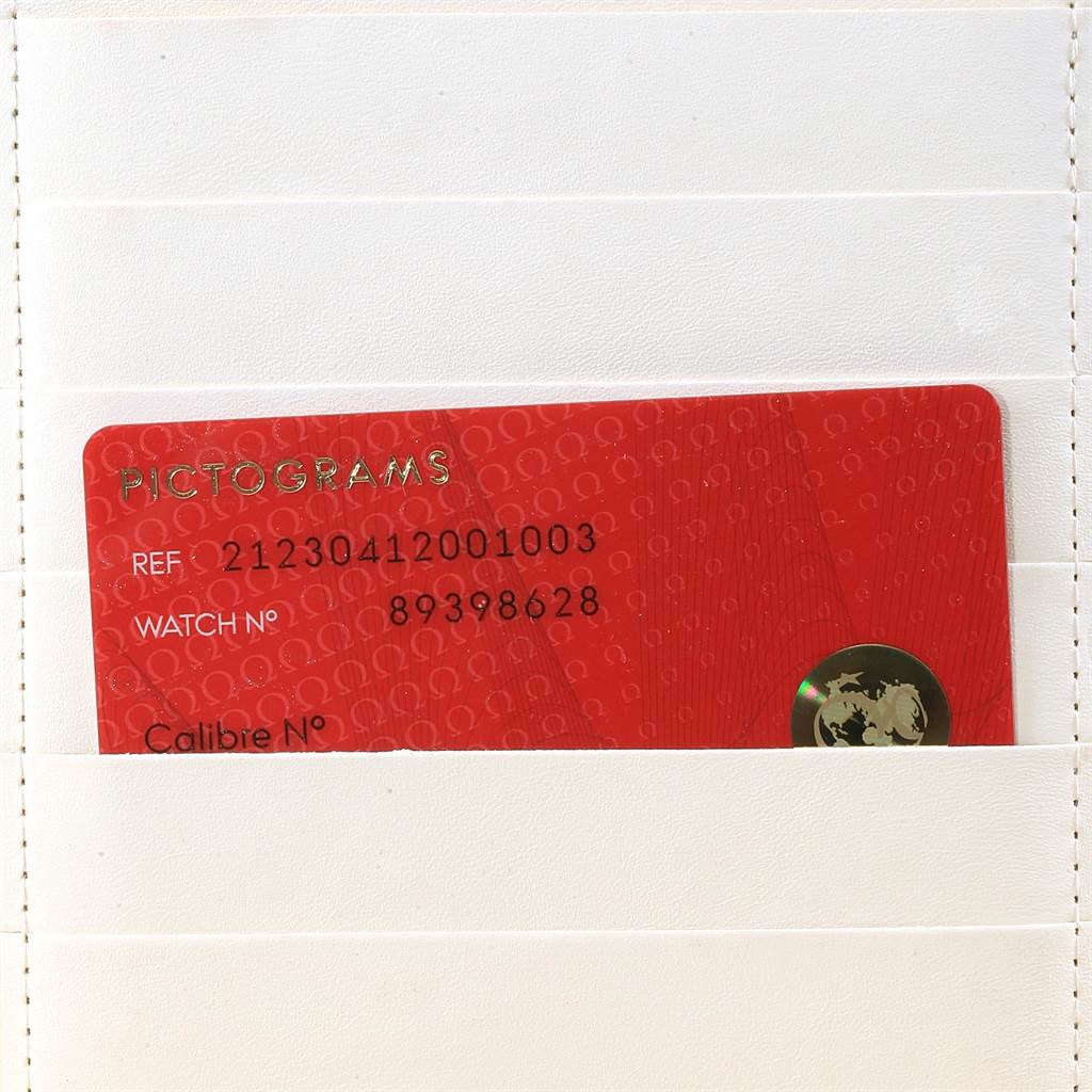 The image shows a red warranty card for an Omega Seamaster 212.30.41.20.01.003 Men
s Stainless Steel Black Dial 212.30.41.20.01.003 Men
s Stainless Steel Black Dial watch, featuring reference and watch numbers, within a white holder.
