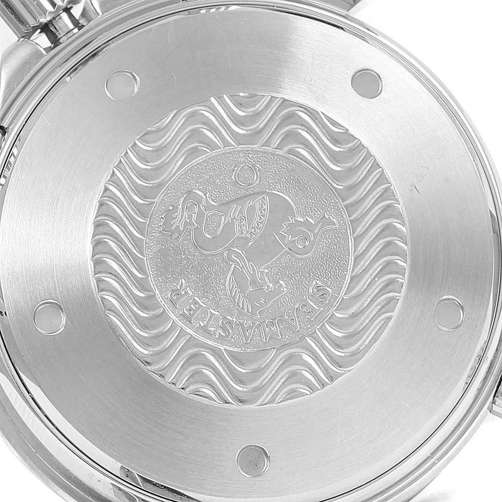 The image shows the case back of the Omega Seamaster 2599.80.00 Men
s Stainless Steel Blue Dial 2599.80.00 Men
s Stainless Steel Blue Dial watch from a close-up, overhead angle.