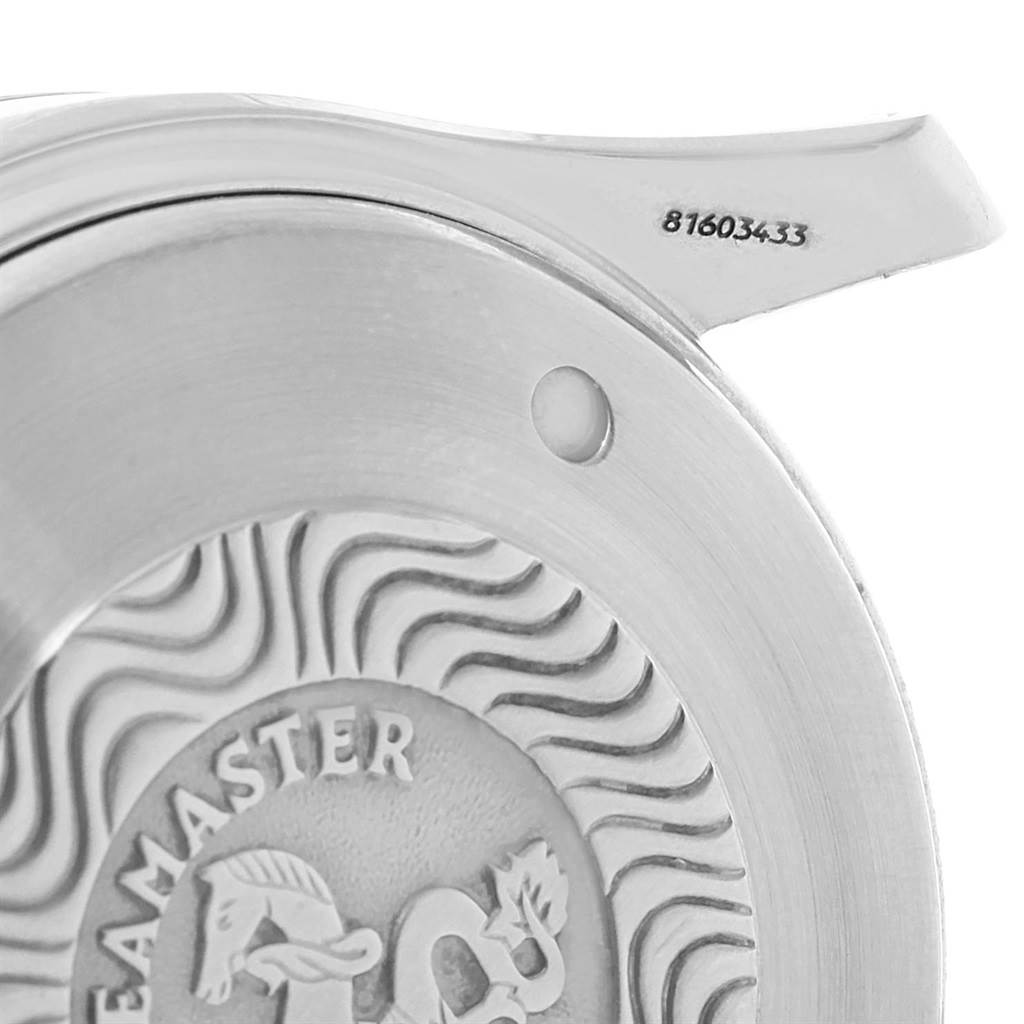 The image shows the back case of an Omega Seamaster 2599.80.00 Men
s Stainless Steel Blue Dial 2599.80.00 Men
s Stainless Steel Blue Dial watch, displaying the brand engraving and serial number.