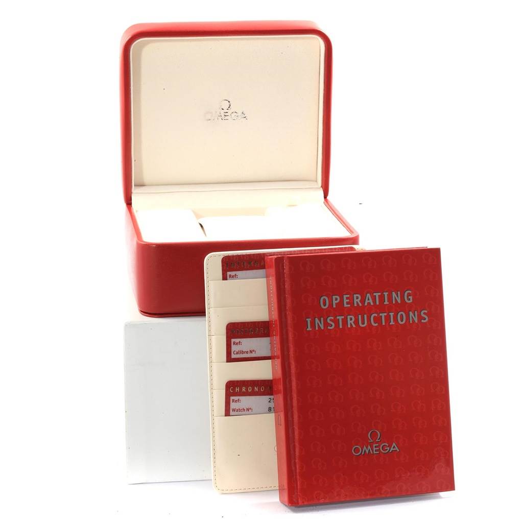 The image shows the Omega Seamaster 2599.80.00 Men
s Stainless Steel Blue Dial 2599.80.00 Men
s Stainless Steel Blue Dial watch box, operating instructions, and cards in red and white.