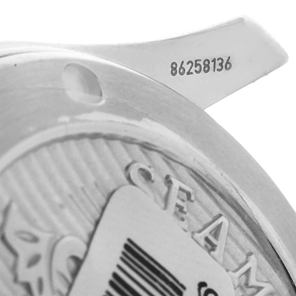 This close-up image shows the case back and serial number of an Omega Seamaster 212.30.36.20.01.002 Men
s Stainless Steel Black Dial 212.30.36.20.01.002 Men
s Stainless Steel Black Dial watch at an angle.