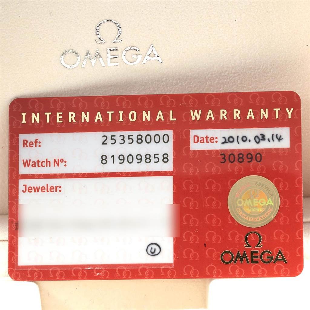 The image shows an Omega Seamaster 2535.80.00 Men
s Stainless Steel Blue Dial 2535.80.00 Men
s Stainless Steel Blue Dial International Warranty card detailing the reference number, watch number, date, and jeweler information.