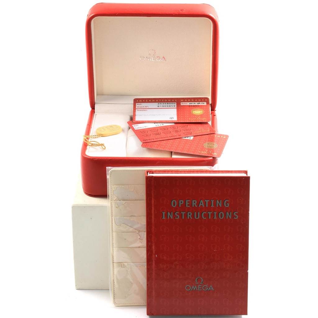 The image shows an Omega Seamaster 2535.80.00 Men
s Stainless Steel Blue Dial 2535.80.00 Men
s Stainless Steel Blue Dial watch box, warranty cards, a tag, and an operating instructions booklet.