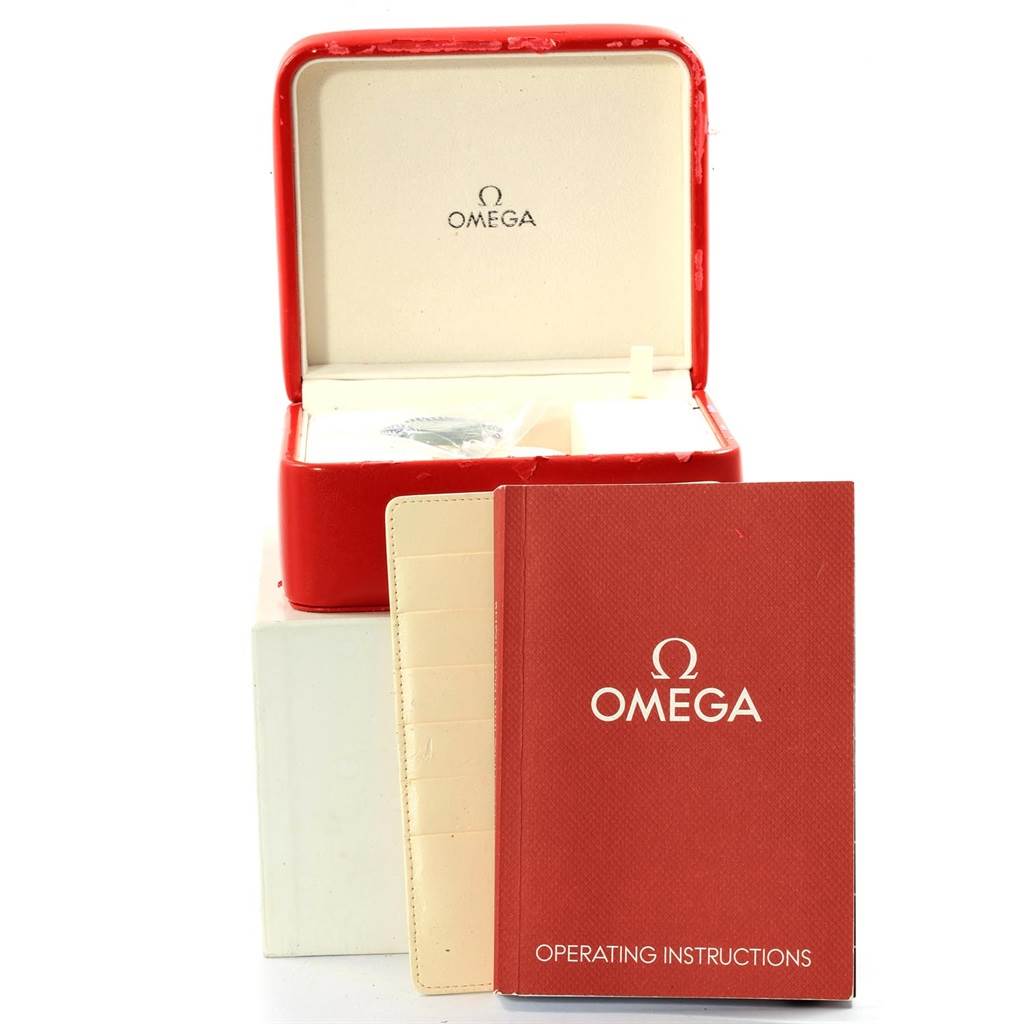 The image shows the Omega Seamaster 212.30.41.20.01.002 Men
s Stainless Steel Black Dial 212.30.41.20.01.002 Men
s Stainless Steel Black Dial
s red case along with its operating instructions manual and a cardholder.