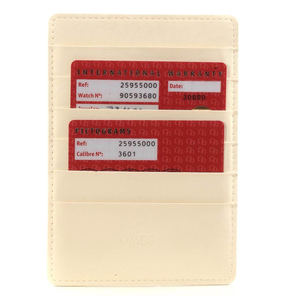 The image shows an Omega Seamaster 2595.50.00 Men
s Stainless Steel Black Dial 2595.50.00 Men
s Stainless Steel Black Dial watch
s warranty and pictogram cards in a beige cardholder.