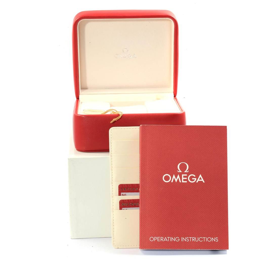 The image shows the packaging and accessories for an Omega Seamaster 2595.50.00 Men
s Stainless Steel Black Dial 2595.50.00 Men
s Stainless Steel Black Dial watch, including a red box, operating instructions, and warranty cards.