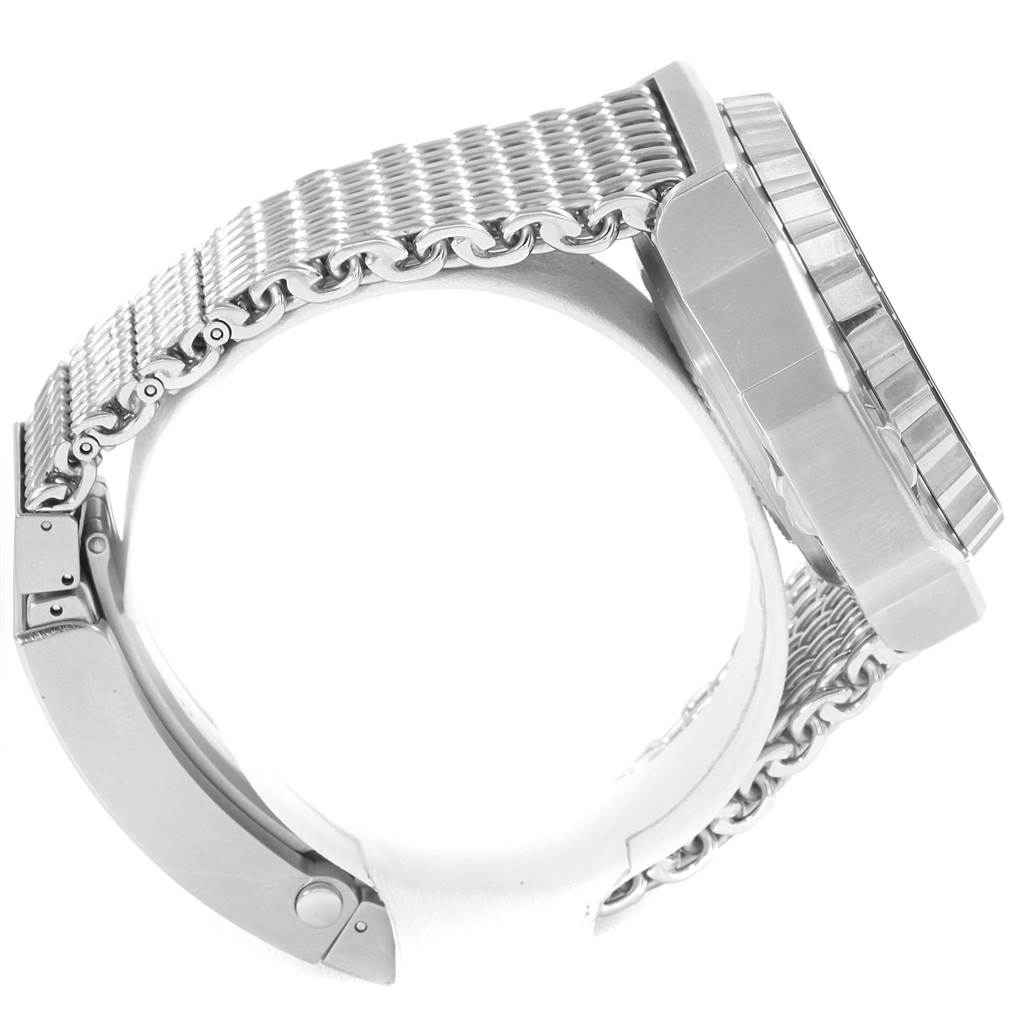 The Omega Ploprof 224.30.55.21.01.001 Men's Stainless Steel Black Dial 224.30.55.21.01.001 Men's Stainless Steel Black Dial watch is shown from the side, highlighting its case and metal bracelet.