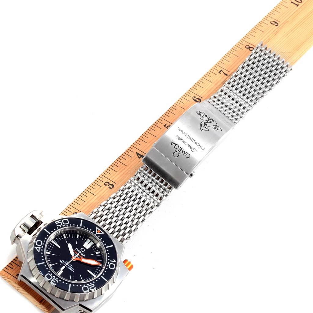 The image shows an Omega Ploprof 224.30.55.21.01.001 Men's Stainless Steel Black Dial 224.30.55.21.01.001 Men's Stainless Steel Black Dial watch laid flat with a metal mesh bracelet and clasp next to a ruler for size reference.