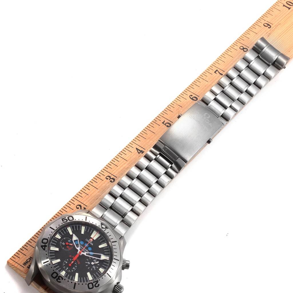 The image shows an Omega Seamaster 2269.52.00 Men's Titanium Black Dial 2269.52.00 Men's Titanium Black Dial watch laid flat, with both the face and metal bracelet visible alongside a ruler for measurement.