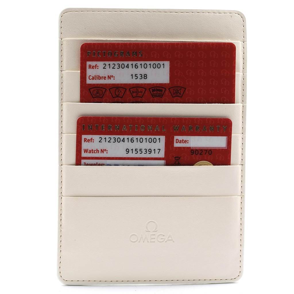 The image shows an Omega Seamaster 212.30.41.61.01.001 Men
s Stainless Steel Black Dial 212.30.41.61.01.001 Men
s Stainless Steel Black Dial model
s warranty cards and documentation in a cream-colored cardholder.