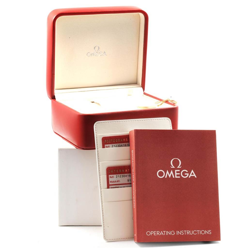 The image shows the watch box, operating instructions, and warranty cards for an Omega Seamaster 212.30.41.61.01.001 Men
s Stainless Steel Black Dial 212.30.41.61.01.001 Men
s Stainless Steel Black Dial model.