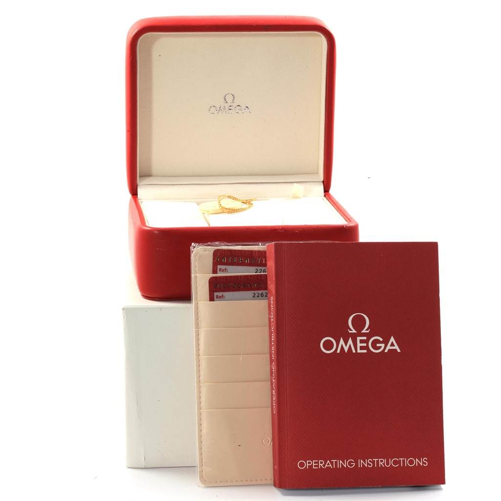 The image shows an Omega Seamaster 2262.50.00 Men
s Stainless Steel Black Dial 2262.50.00 Men
s Stainless Steel Black Dial set with a red box, warranty cards, and an operating instructions booklet.