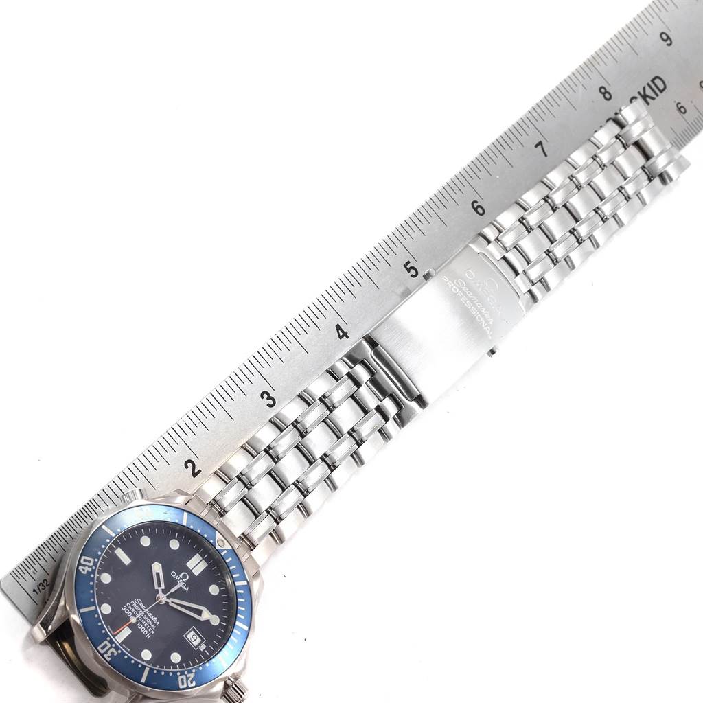 The Omega Seamaster 2531.80.00 Men
s Stainless Steel Blue Dial 2531.80.00 Men
s Stainless Steel Blue Dial watch is shown from a top-down angle with a ruler measuring its metal bracelet.