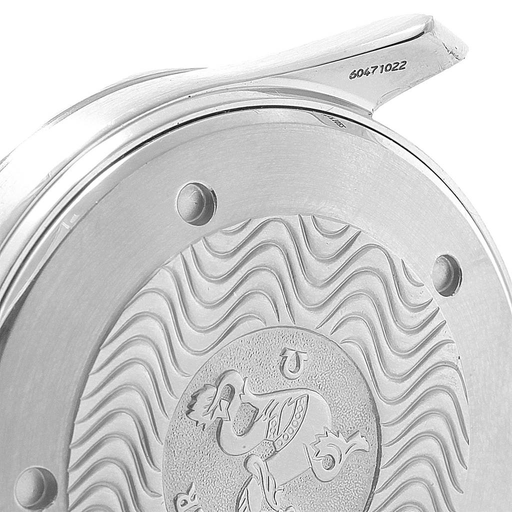 The image shows a close-up angle of the case back of an Omega Seamaster 2531.80.00 Men
s Stainless Steel Blue Dial 2531.80.00 Men
s Stainless Steel Blue Dial watch, highlighting its intricate engraving and serial number.