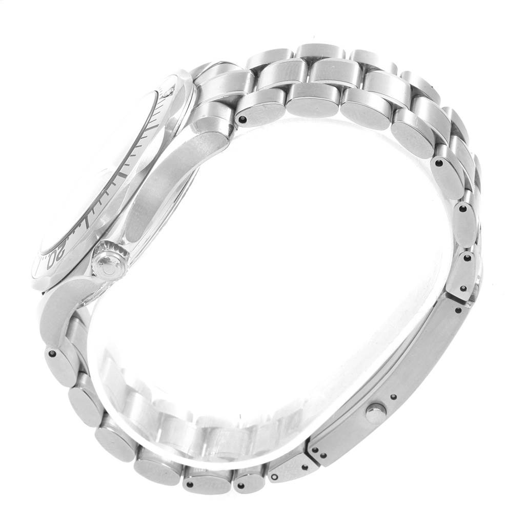 The image shows a side view of the Omega Seamaster 2255.80.00 Men
s Stainless Steel Blue Dial 2255.80.00 Men
s Stainless Steel Blue Dial watch, highlighting the bezel, crown, and stainless steel bracelet.