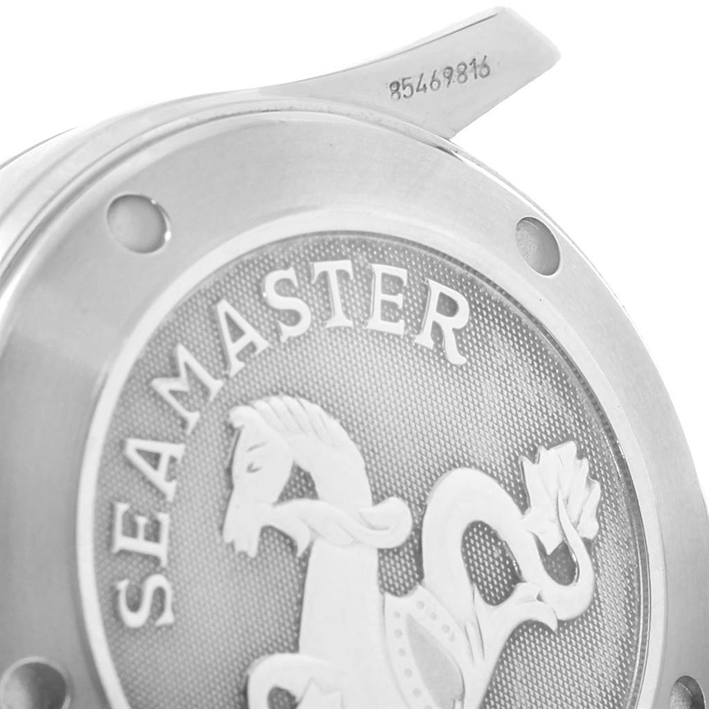 This image shows the back case of an Omega Seamaster 212.30.36.20.01.001 Men
s Stainless Steel Black Dial 212.30.36.20.01.001 Men
s Stainless Steel Black Dial watch, featuring its engraved emblem and part of the serial number.