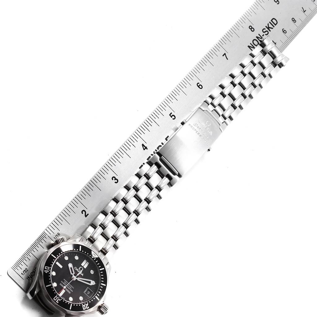 The image shows an Omega Seamaster 212.30.36.20.01.001 Men
s Stainless Steel Black Dial 212.30.36.20.01.001 Men
s Stainless Steel Black Dial watch laid flat with its metal bracelet measured alongside a ruler.