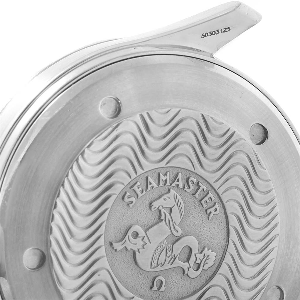 This image shows a close-up of the back case of an Omega Seamaster 2531.80.00 Men
s Stainless Steel Blue Dial 2531.80.00 Men
s Stainless Steel Blue Dial watch, highlighting its embossed logo and wave pattern.