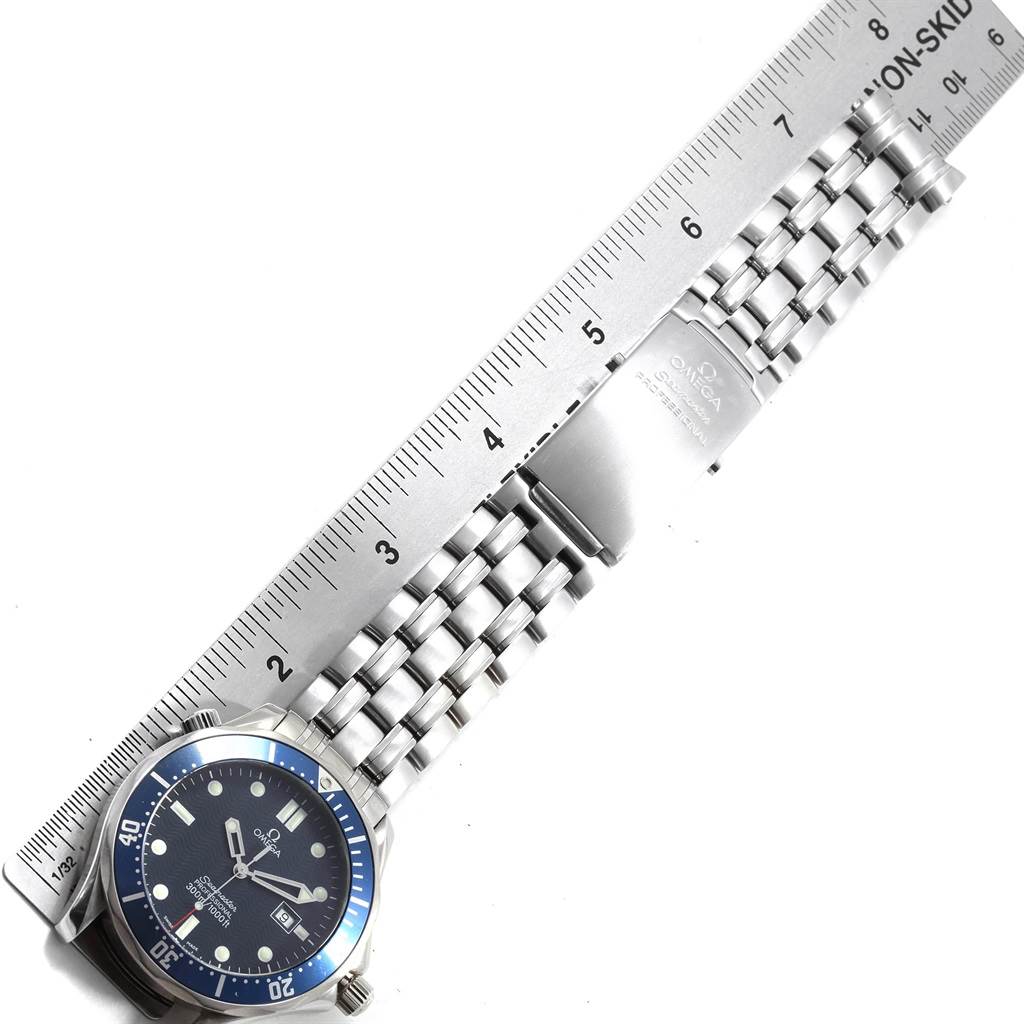 The image shows the Omega Seamaster 2541.80.00 Men
s Stainless Steel Blue Dial 2541.80.00 Men
s Stainless Steel Blue Dial watch laid flat with a ruler measuring its band.