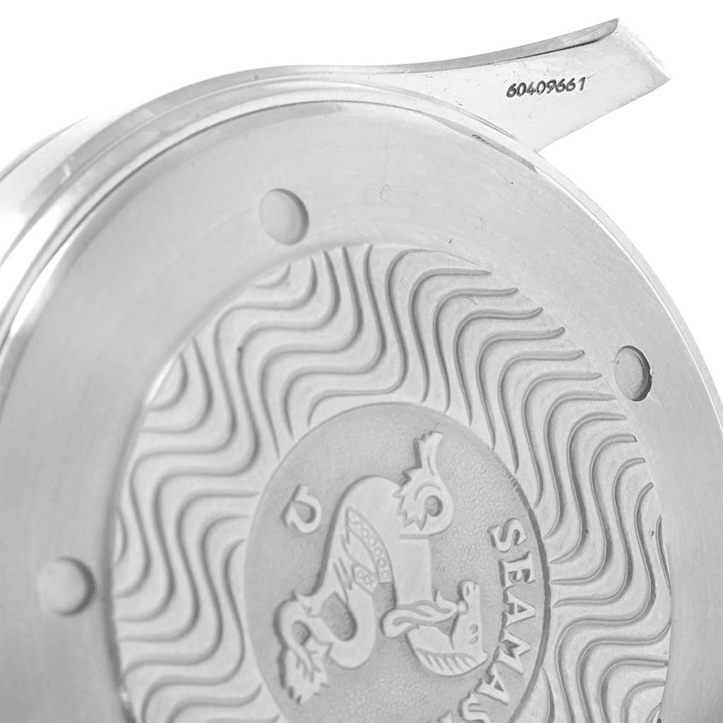 This image shows the case back of an Omega Seamaster 2531.80.00 Men
s Stainless Steel Blue Dial 2531.80.00 Men
s Stainless Steel Blue Dial watch, highlighting its wavy pattern and logo.